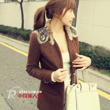 毛呢大衣添点新花样 演绎与众不同街头秀