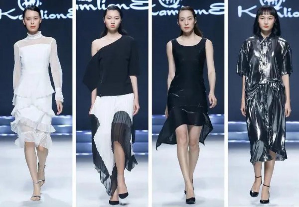 没有现场观众的时装秀台 带着口罩也要走得精彩