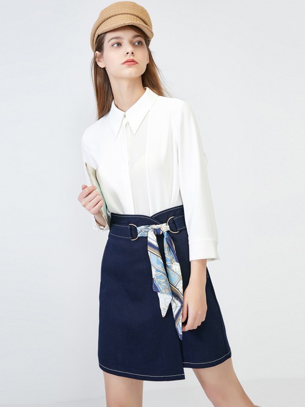 A字短裙搭配什么上衣好看?短裙怎么搭配更显高?