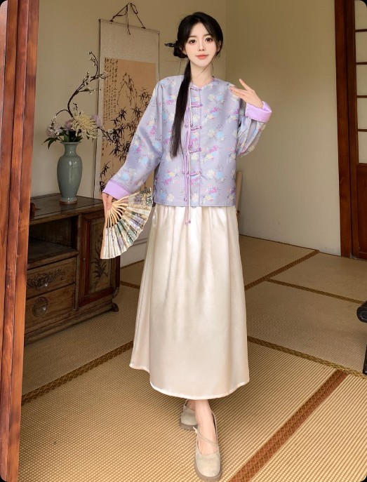 新闻联播主播服装变迁:一件墨绿外套如何引爆新中式产业链?
