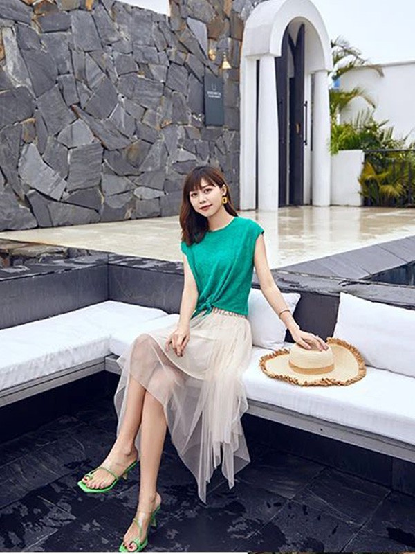 布卡慕尚2020夏季米色纱网半身裙