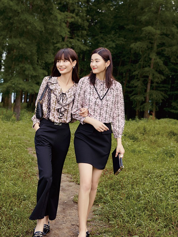 千百惠2021秋冬季黑色纯色包臀裙