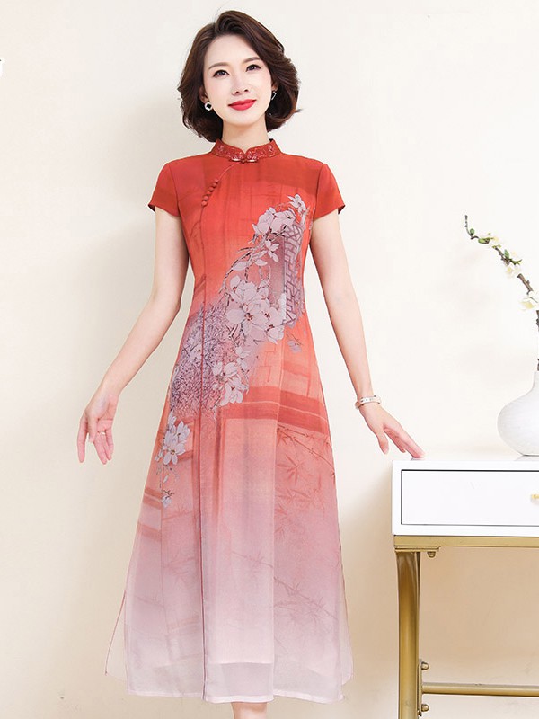 帛媛2021春夏季橙色印花连衣裙