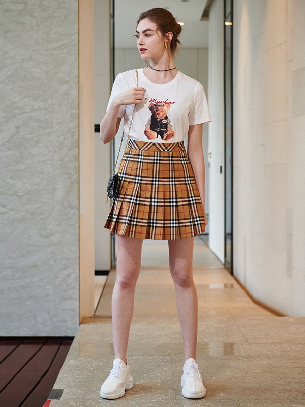 海尼2021春夏季黄色格子百褶裙