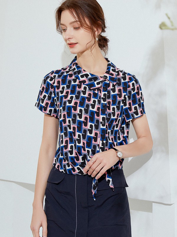 乔妮塔女装2022春夏季藏蓝色印花雪纺衫