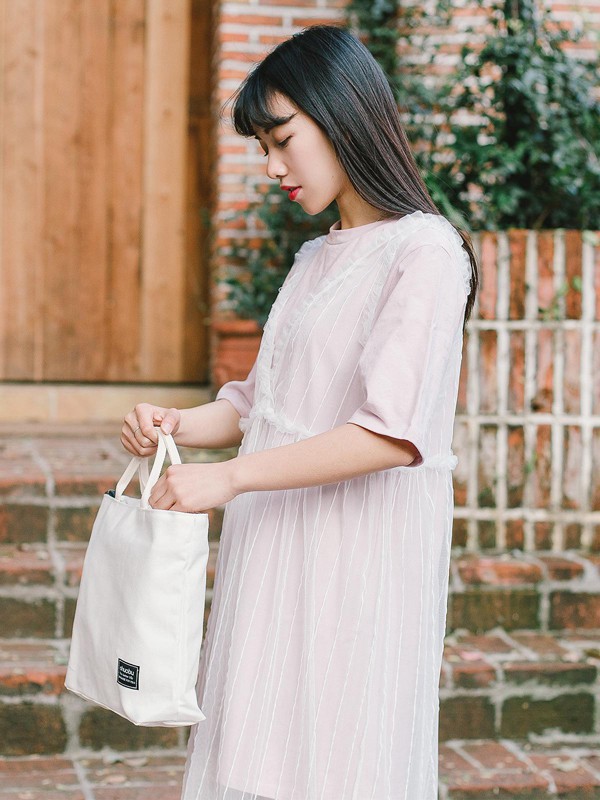 沐沢女装2022春夏季白色纯色连衣裙