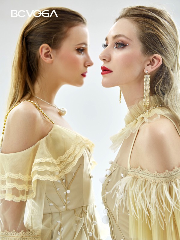 百丝2021春夏季黄色纱网连衣裙