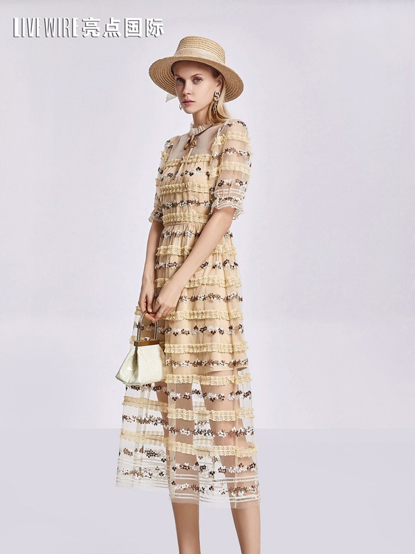 亮点2021春夏季黄色木耳边连衣裙