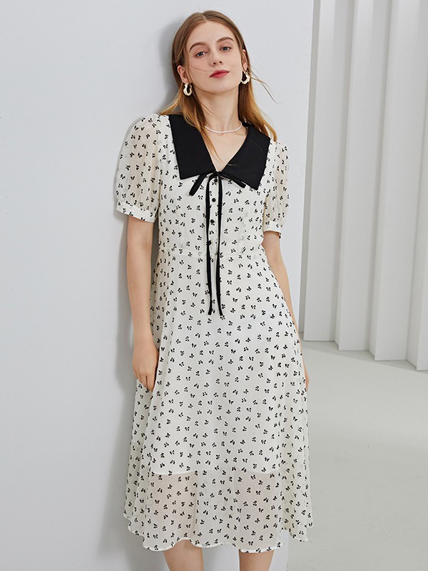 紫淑女装2021春夏季白色波点连衣裙