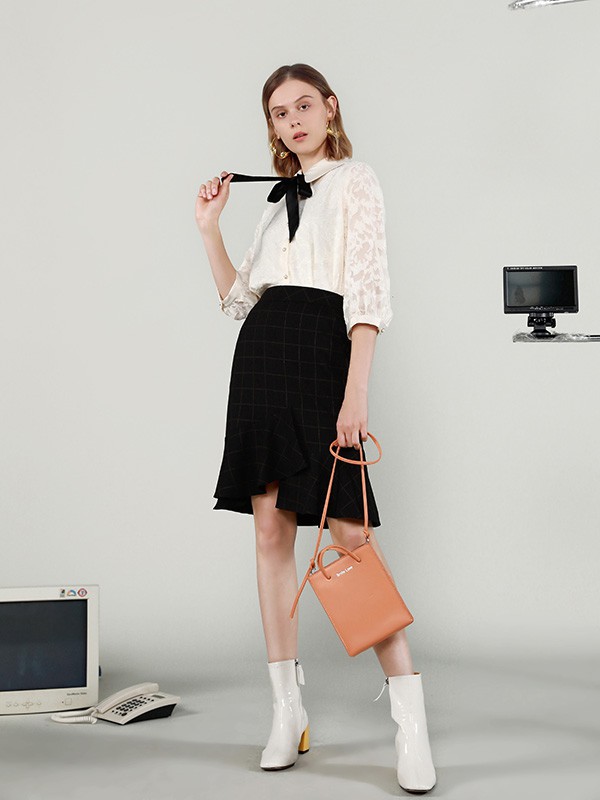 百图2021秋冬季黑色格子半身裙