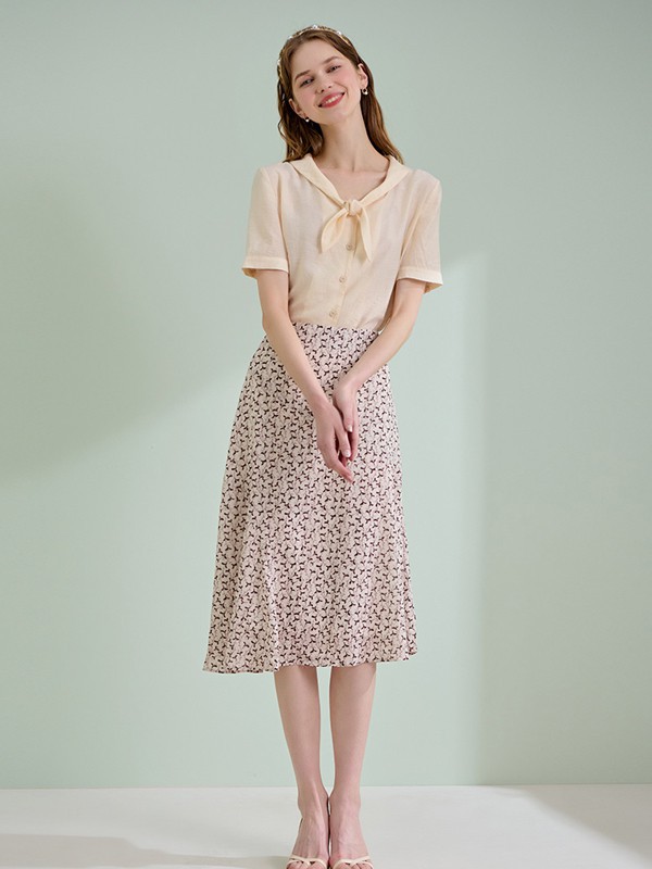 轩日女装2021春夏季米色印花半身裙