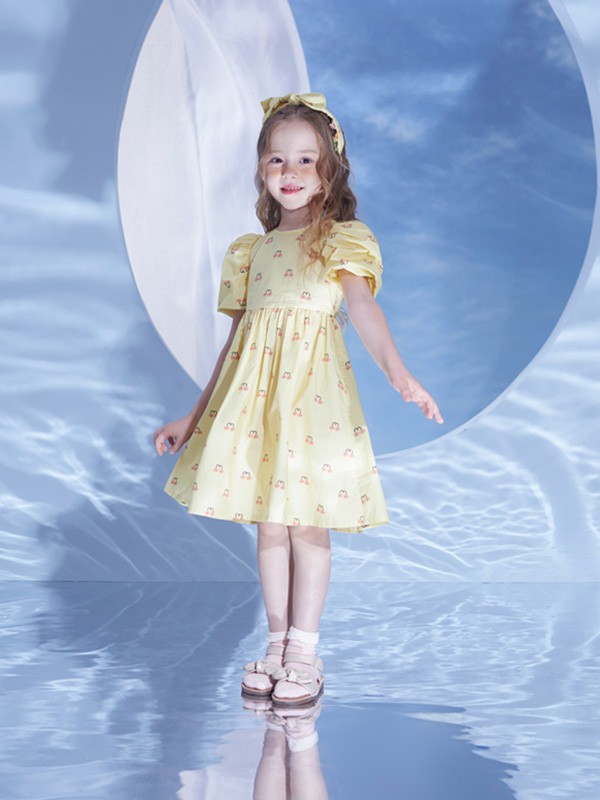 马骑顿2021春夏季黄色印花连衣裙