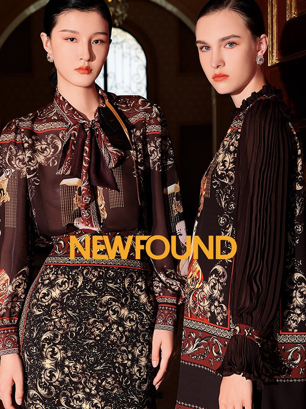 纽方2021秋冬季黑色印花包臀裙