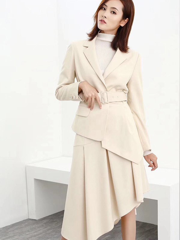 DakaTrip2022秋冬季米色半身裙