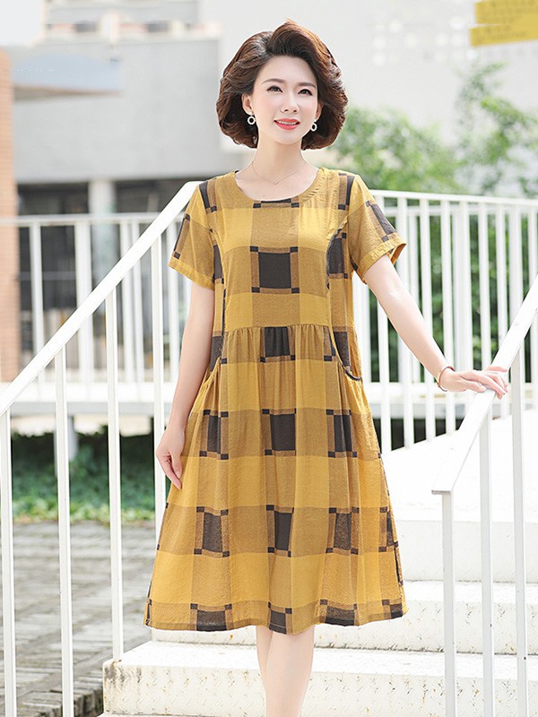 简狐2023春夏季黄色连衣裙
