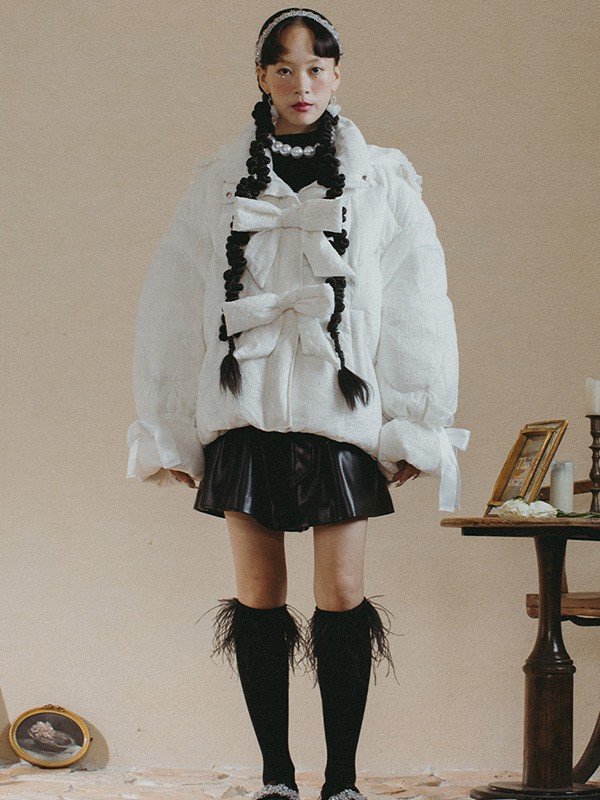 马克华菲女装2022春夏季黑色纯色短裙