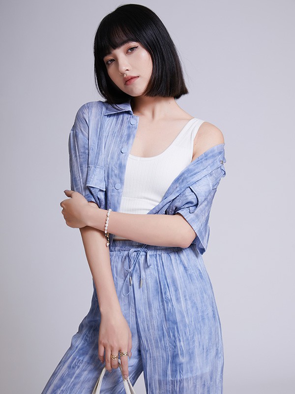 闻讯2022春夏季蓝色印花阔腿裤