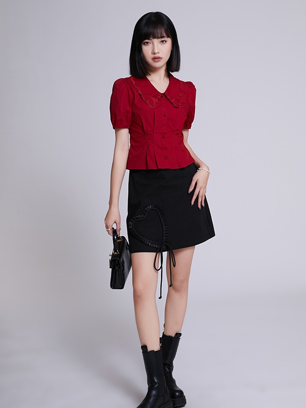 闻讯2022春夏季黑色纯色短裙