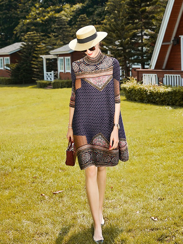 卡米兰女装2022春夏季藏蓝色印花连衣裙