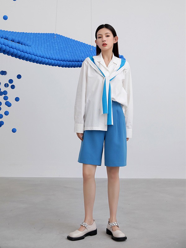 衣莱尔2022春夏季白色不对称外套