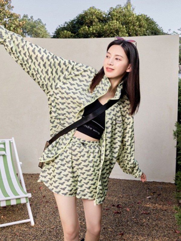 千黛百合女装2022春夏季绿色印花短裤