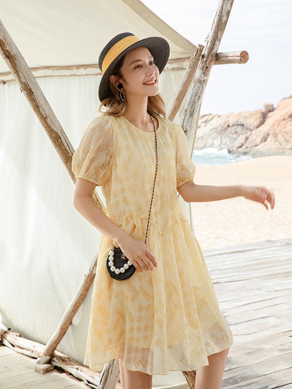 藏九2022春夏季黄色印花连衣裙
