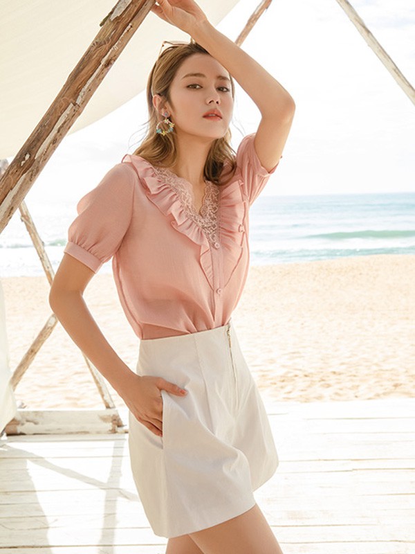 藏九2022春夏季白色纯色短裙