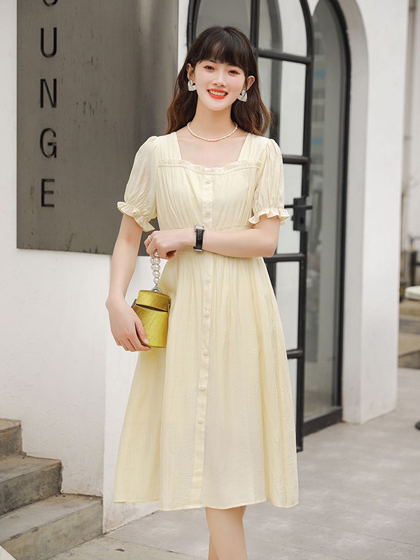 唯可佳2022春夏季米色纯色连衣裙