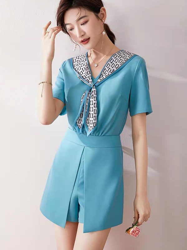 爱依莲2022春夏季蓝色纯色短裤