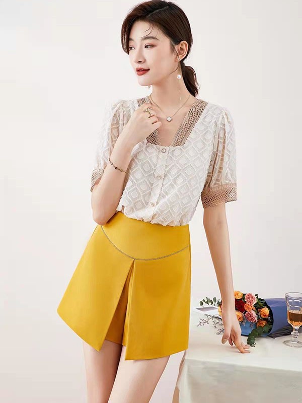 爱依莲2022春夏季黄色纯色短裤