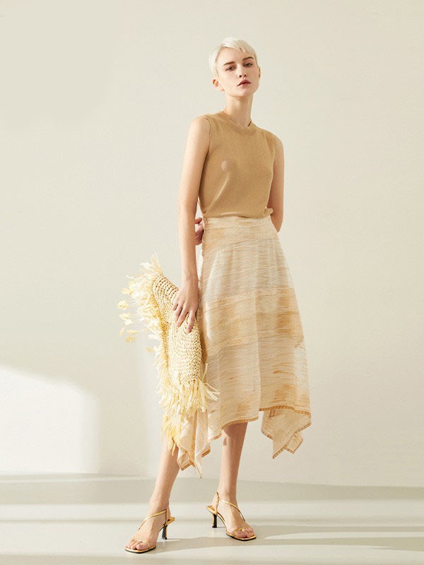 锡瑅2022秋冬季米色褶皱半身裙