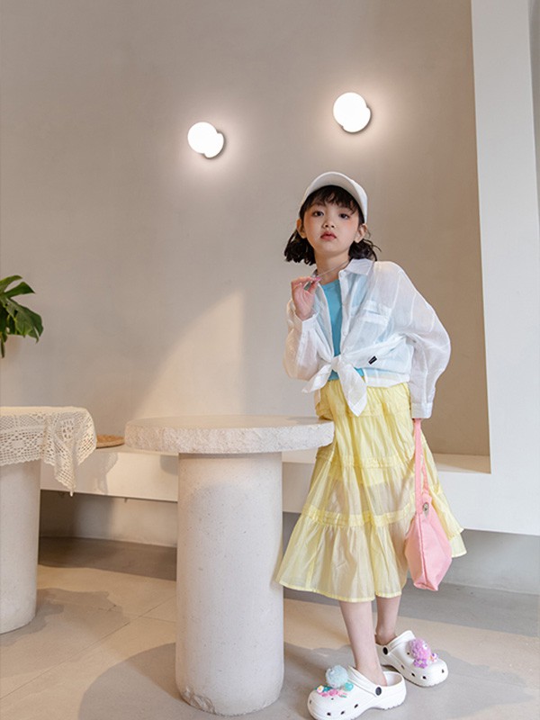 朴与素童装2022春夏季黄色半身裙