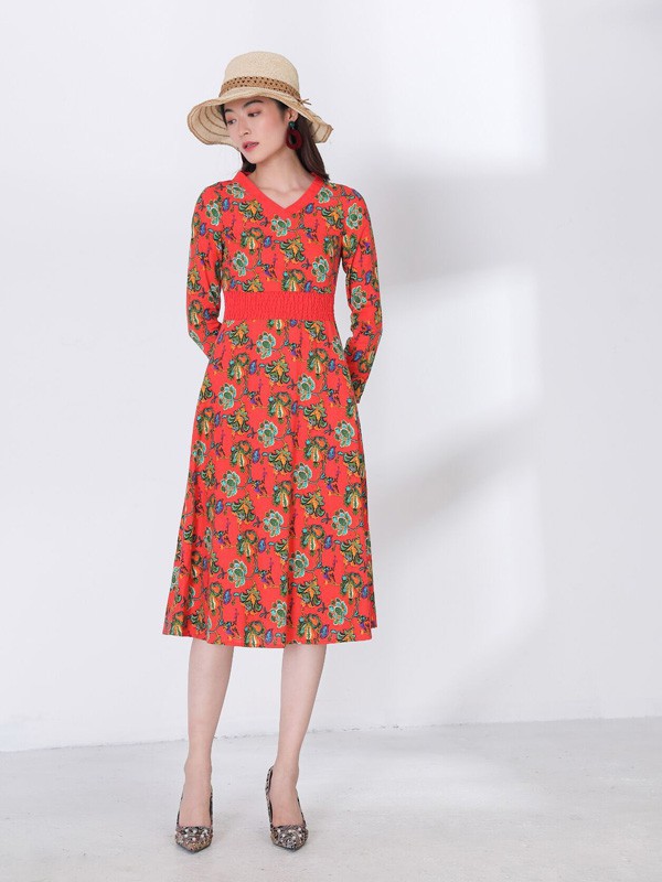 千唐绣女装2021秋冬季橙色连衣裙