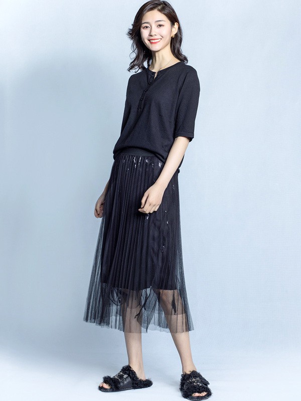 纽纳斯休闲装2022春夏季黑色半身裙