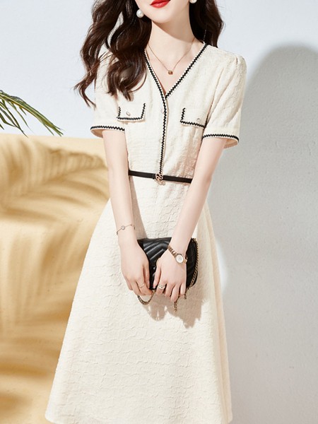 佐思琳女装2022春夏季米色连衣裙