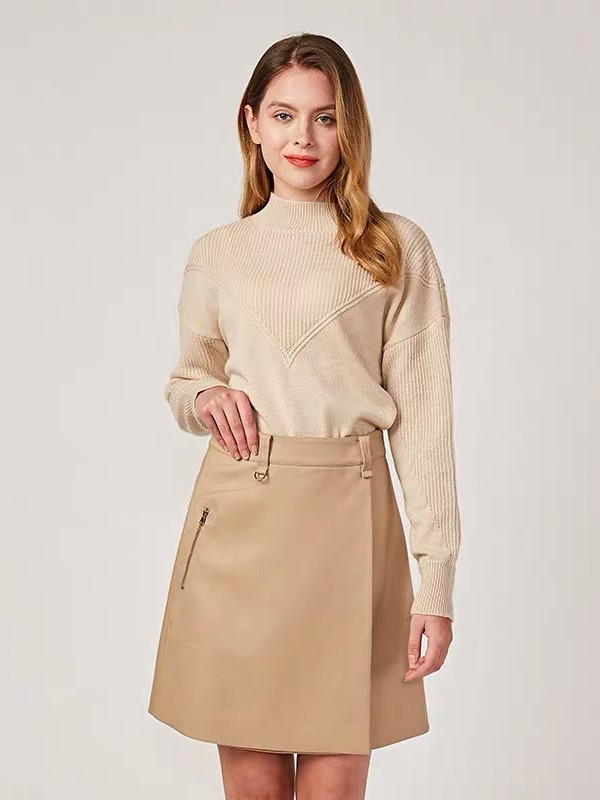 藏九女装2022秋冬季卡其色短裙