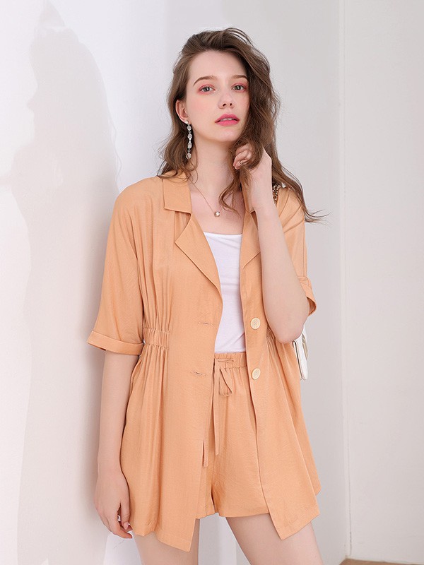 上东轻奢女装2022春夏季橙色衬衫