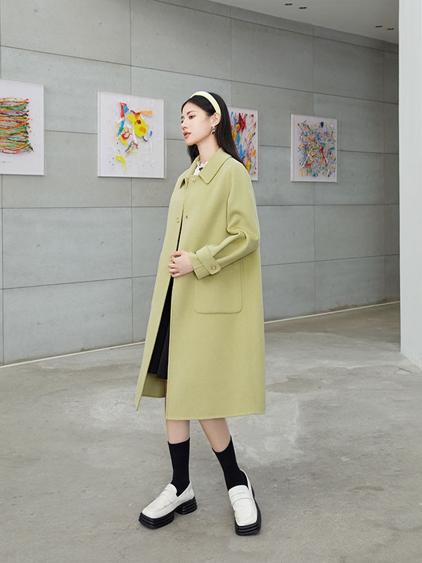 曼秀缤纷2022秋冬季绿色大衣