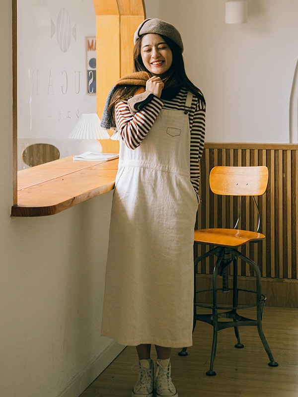 绽放女装2022秋冬季白色背带裙