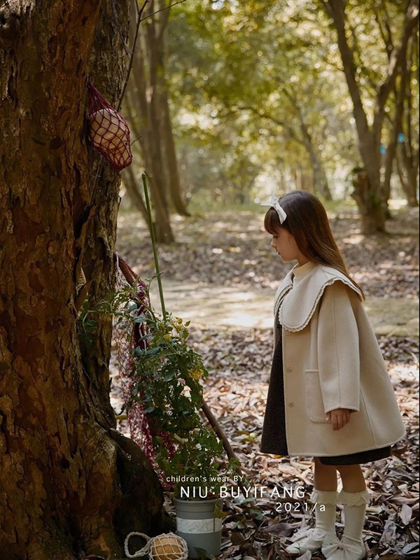 妞·布衣坊2022秋冬季卡其色大衣