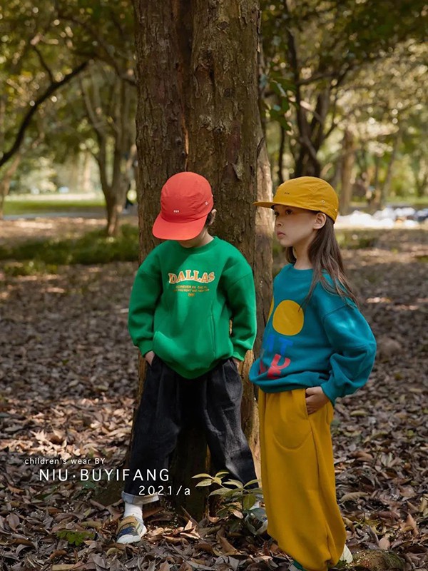 妞·布衣坊2022秋冬季绿色T恤