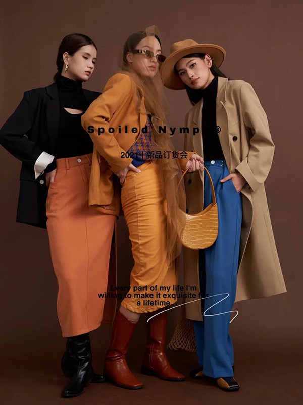 妲小姐女装2022秋冬季橙色包臀裙