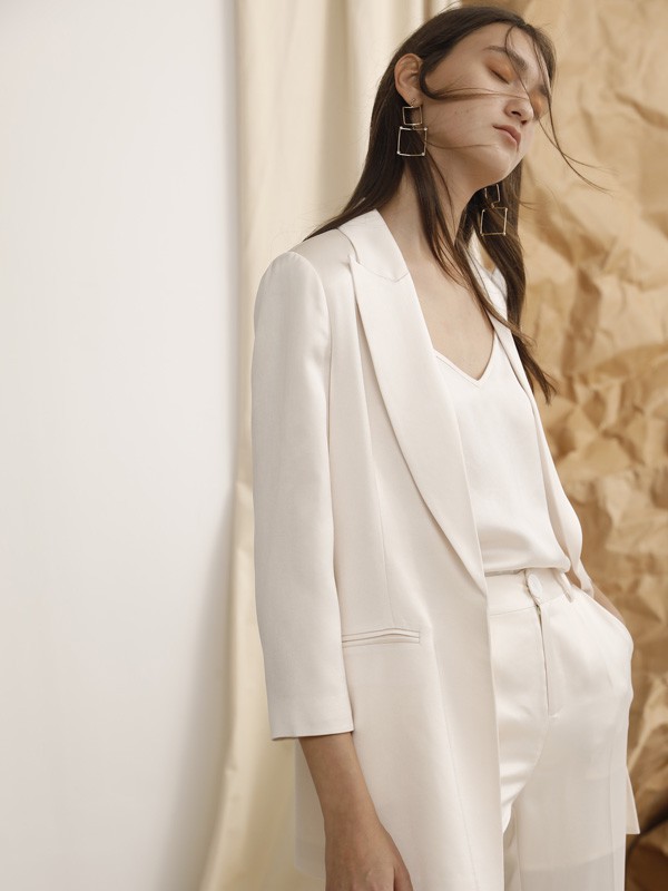 衣之吻女装2023春夏季白色背心