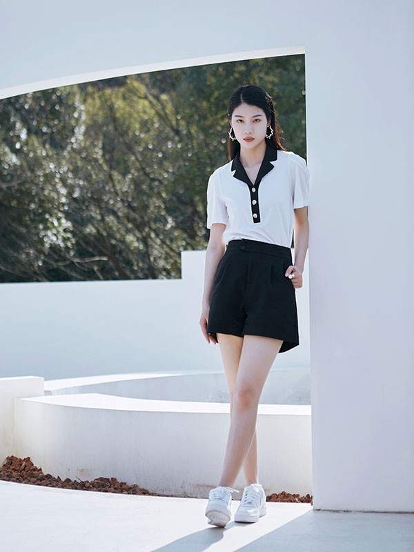 她谷女装2023春夏季黑色短裙