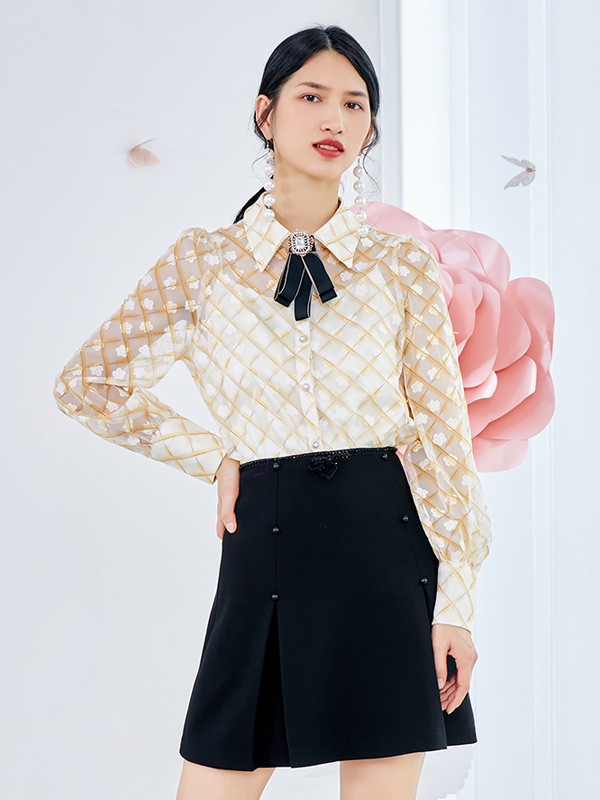 依妙女装2023春夏季肤色短裙