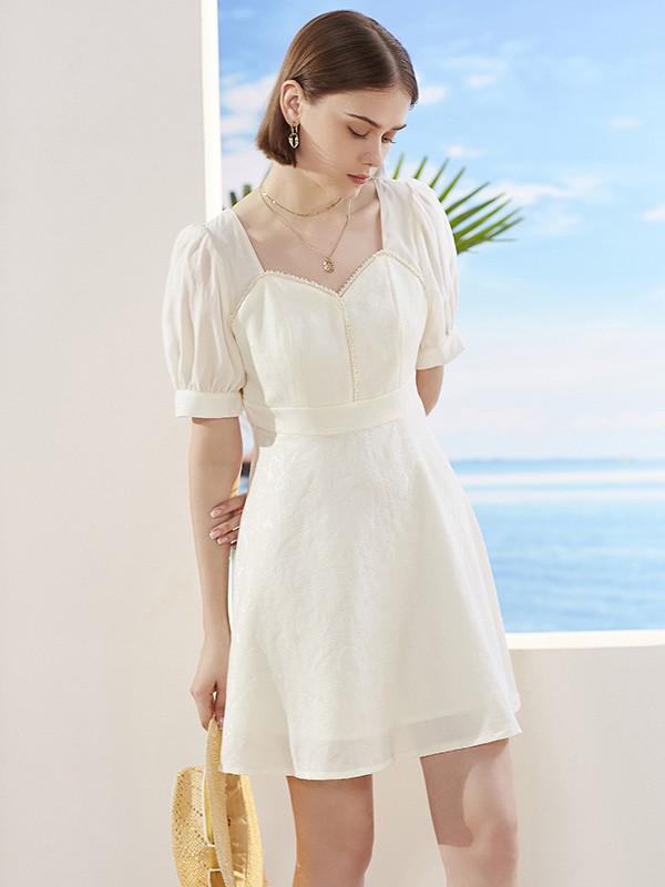 百图女装2023春夏季白色连衣裙