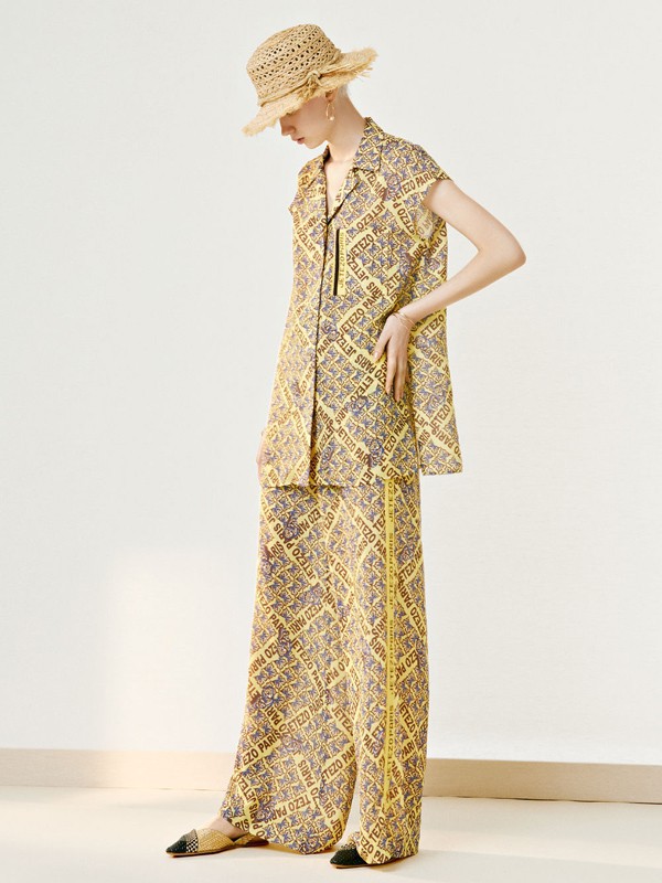 裘堤婼女装2023春夏季黄色长裙