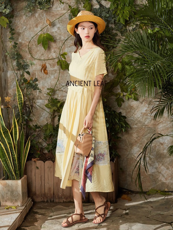 古树叶女装2023春夏季黄色连衣裙
