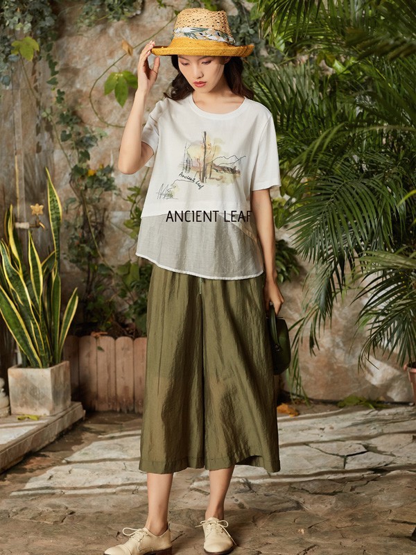 古树叶女装2023春夏季军绿色长裙